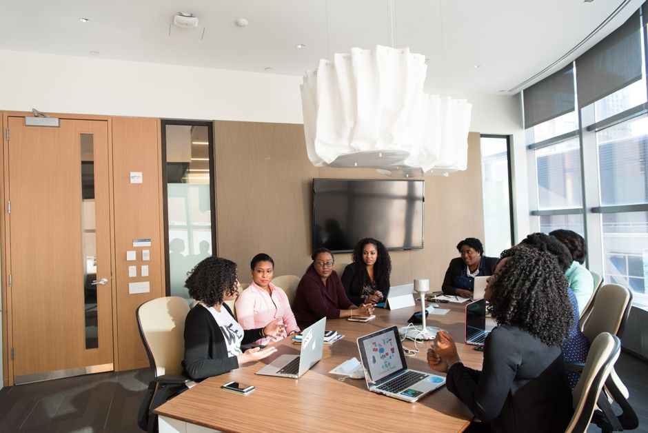 Modern boardroom setting with a diverse team collaborating strategically – Michael Hurckes Reviews